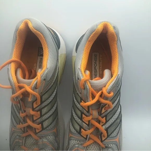 Adidas men’s silver and orange, athletic shoes, size 11.5.