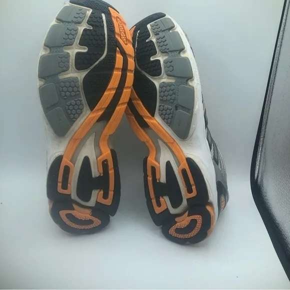 Adidas men’s silver and orange, athletic shoes, size 11.5.