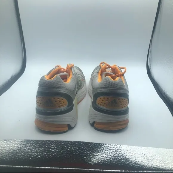 Adidas men’s silver and orange, athletic shoes, size 11.5.