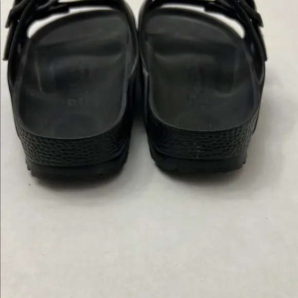 Birkenstock Black Sandals with Adjustable Straps and Contoured Footbed