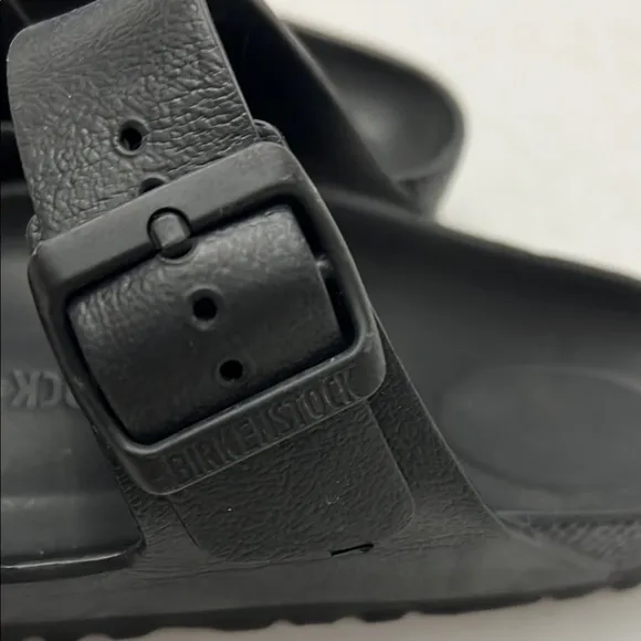 Birkenstock Black Sandals with Adjustable Straps and Contoured Footbed