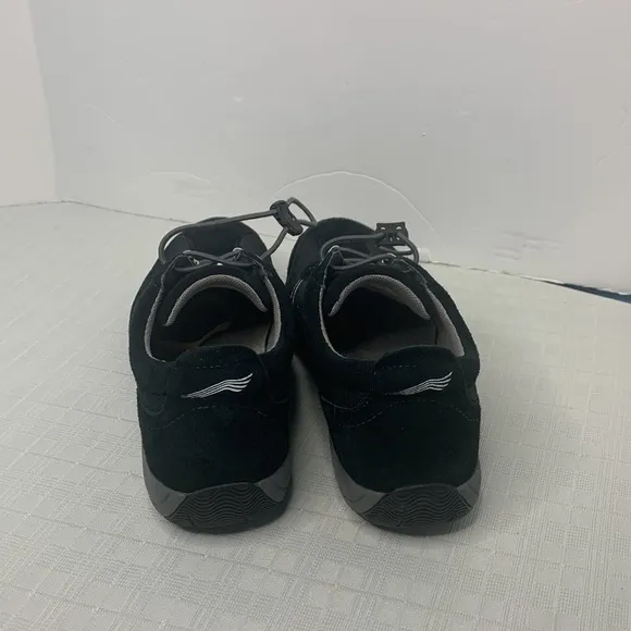 Dansko Helen sneakers in black with white trim