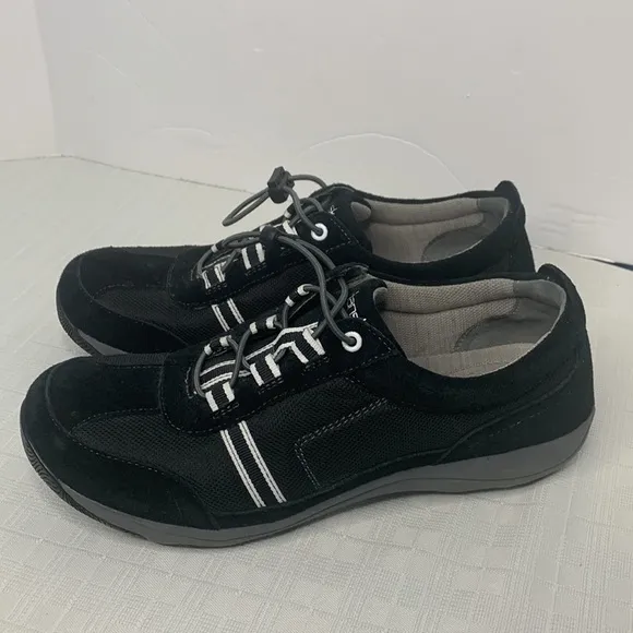 Dansko Helen sneakers in black with white trim