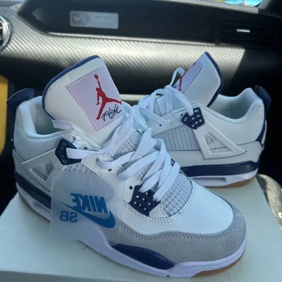 Jordan 4 White and Blue Sneakers