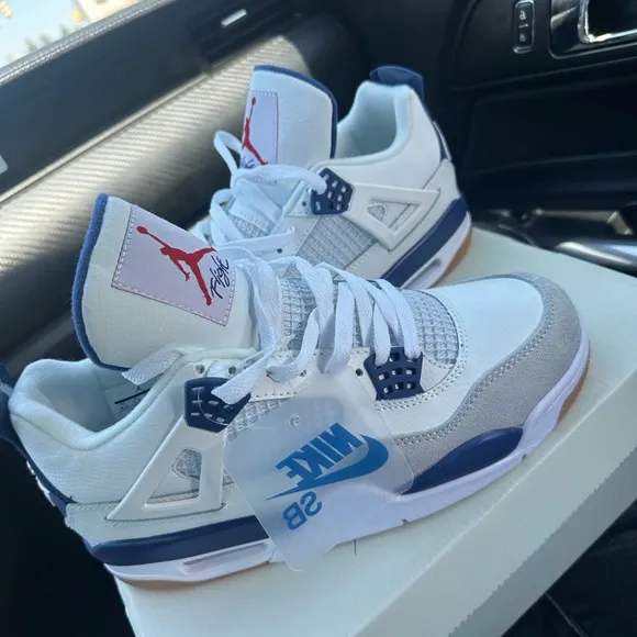 Jordan 4 White and Blue Sneakers