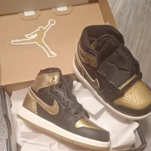 Jordan Black and Gold Air Sneakers