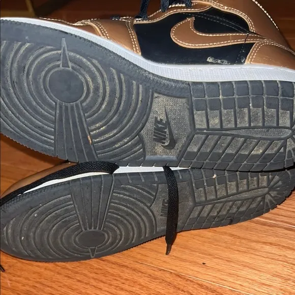 Jordan Black and Gold Sneakers with Classic Design