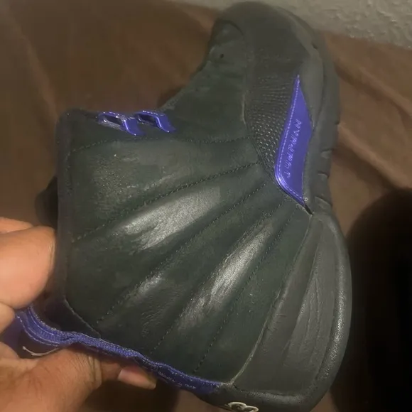 Jordan Black and Purple High-Top Sneakers with Sleek Design