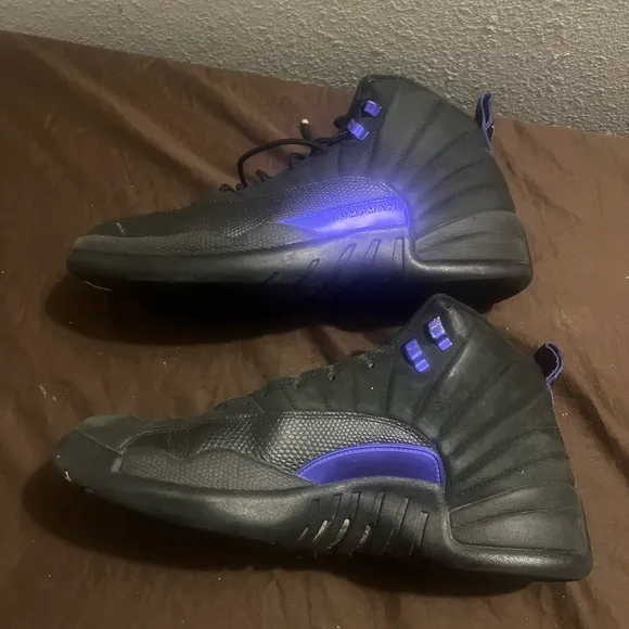 Jordan Black and Purple High-Top Sneakers with Sleek Design