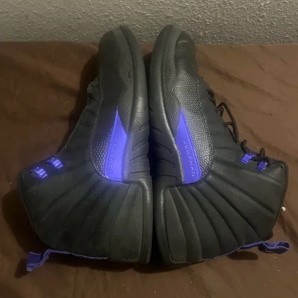 Jordan Black and Purple High-Top Sneakers with Sleek Design
