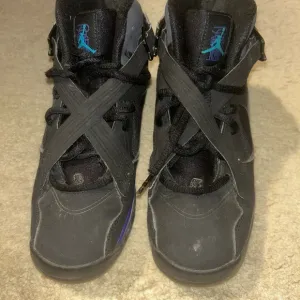 Jordan Black Sneakers with Cross-Strap Design