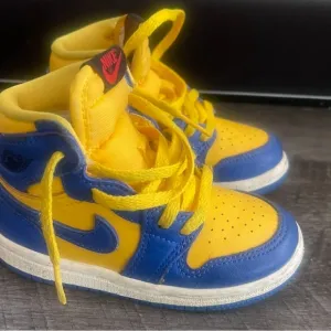 Jordan Retro 1 High OG Nike Blue and Yellow High-Top Sneakers