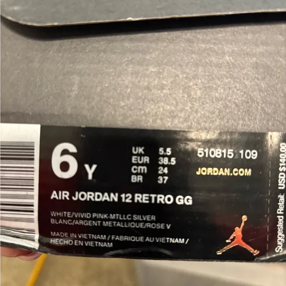 Jordan White and Pink High-Top Sneakers
