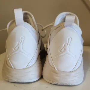 Jordan White Sneakers with Textured Fabric and Heel Support