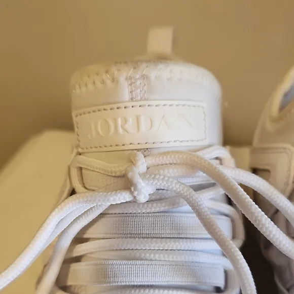 Jordan White Sneakers with Textured Fabric and Heel Support