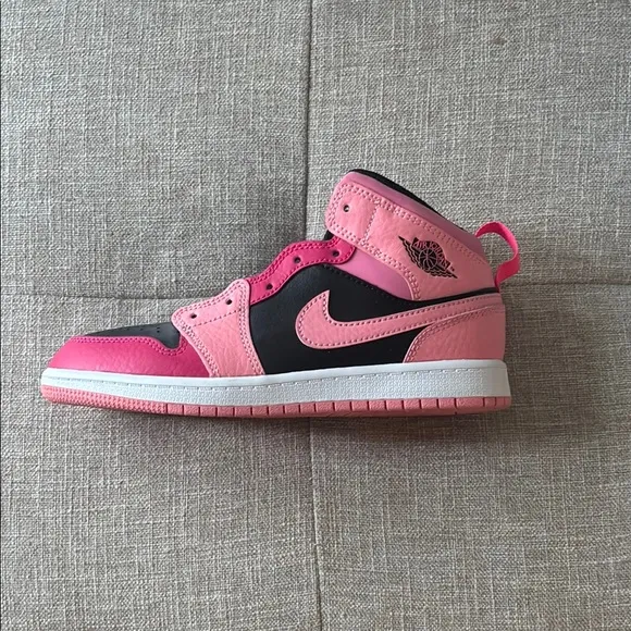 Kids Pink and Black Nike Sneakers
