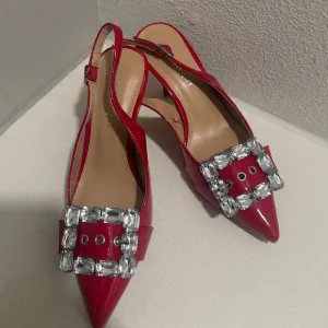 Madden Girl Red Heels with Ornate Buckle