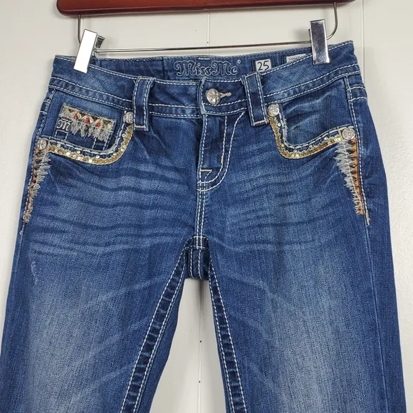 Miss Me embrroidered, rhinestone, studded signature boot cut jeans size 25