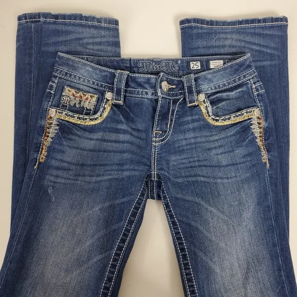 Miss Me embrroidered, rhinestone, studded signature boot cut jeans size 25