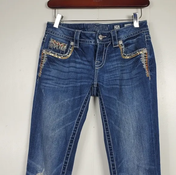 Miss Me embrroidered, rhinestone, studded signature boot cut jeans size 25