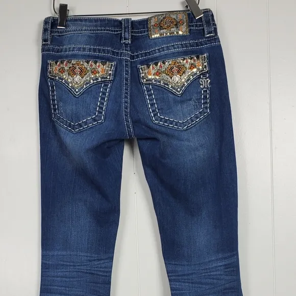 Miss Me embrroidered, rhinestone, studded signature boot cut jeans size 25