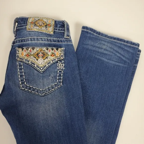 Miss Me embrroidered, rhinestone, studded signature boot cut jeans size 25