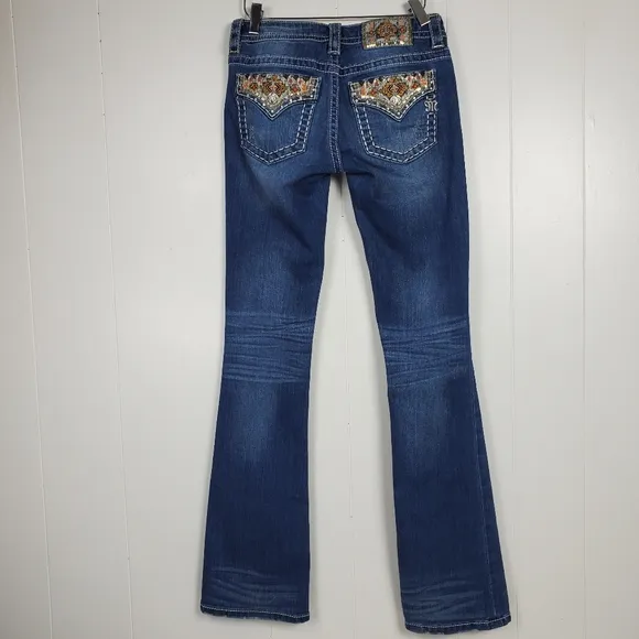 Miss Me embrroidered, rhinestone, studded signature boot cut jeans size 25