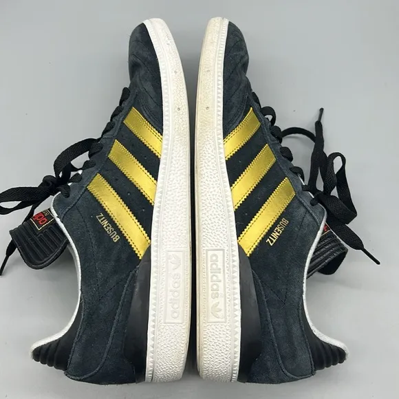 Navy Blue Adidas Busentiz Size 10.5 gold stripe