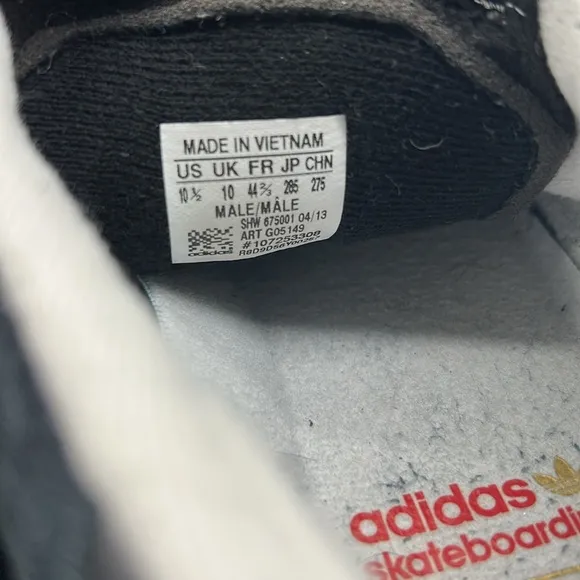 Navy Blue Adidas Busentiz Size 10.5 gold stripe