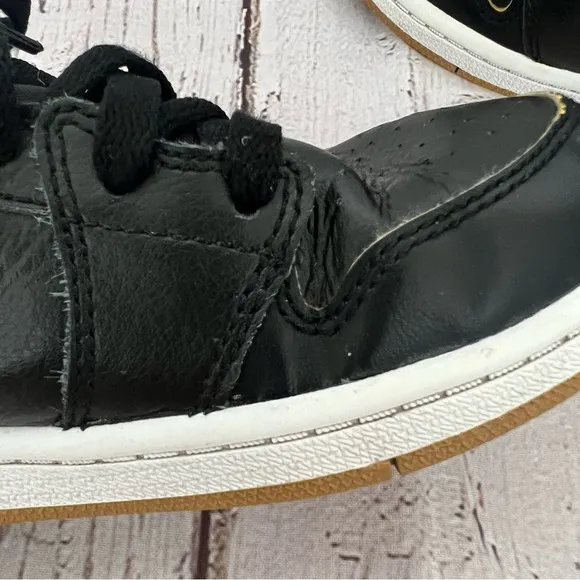 Nike Air Jordan 1 Kid’s Retro Black and Gold Basketball Shoes, Size 1.5Y