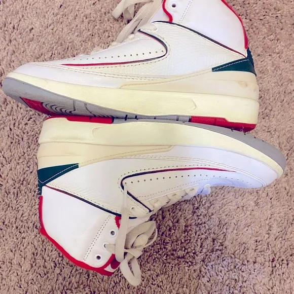 Nike Air Jordan White and Red High-Top Sneakers with Classic Basketball Design
