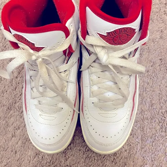 Nike Air Jordan White and Red High-Top Sneakers with Classic Basketball Design