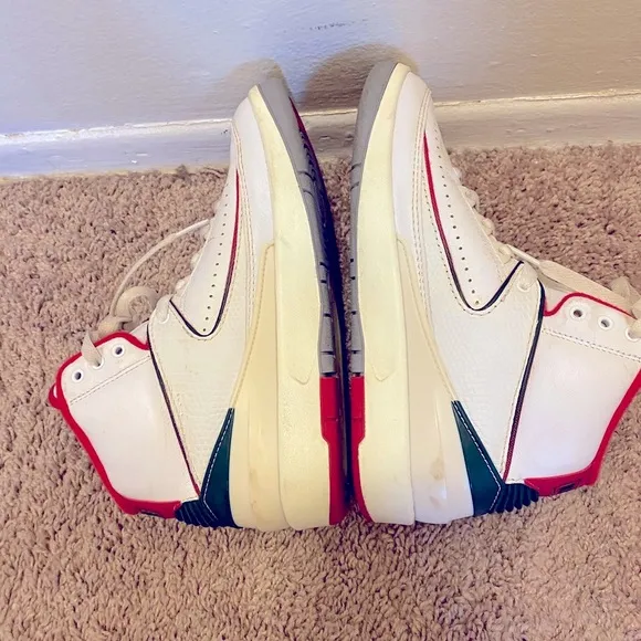Nike Air Jordan White and Red High-Top Sneakers with Classic Basketball Design