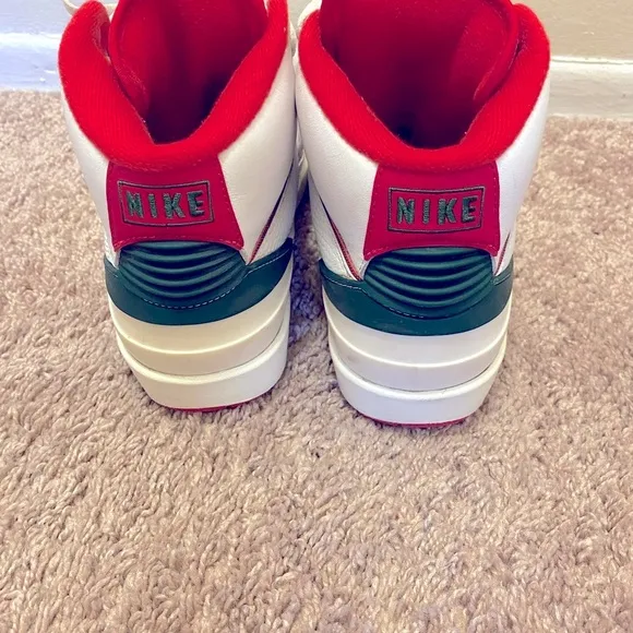 Nike Air Jordan White and Red High-Top Sneakers with Classic Basketball Design