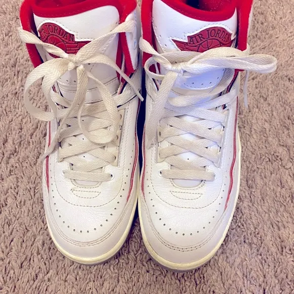 Nike Air Jordan White and Red High-Top Sneakers with Classic Basketball Design