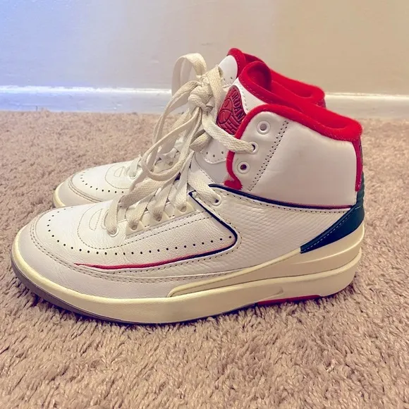 Nike Air Jordan White and Red High-Top Sneakers with Classic Basketball Design