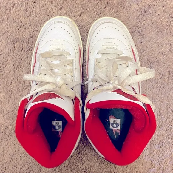 Nike Air Jordan White and Red High-Top Sneakers with Classic Basketball Design