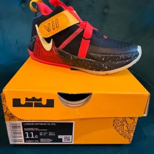 Nike Black and Red High-Top Sneakers with Adjustable Straps