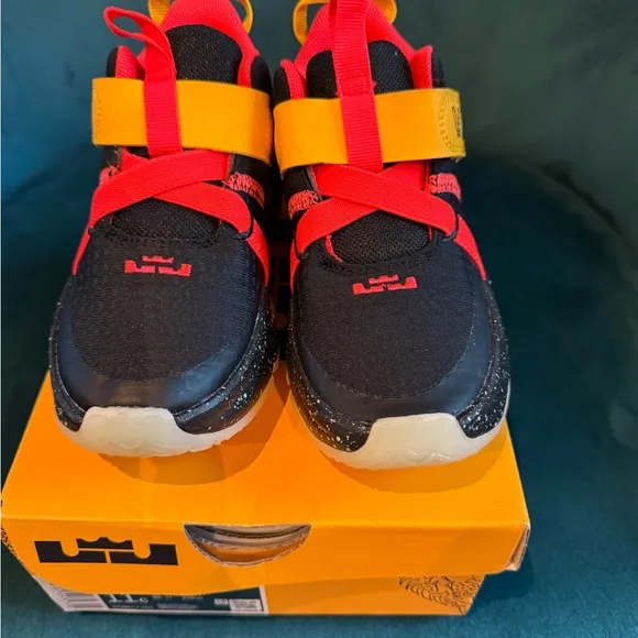 Nike Black and Red High-Top Sneakers with Adjustable Straps