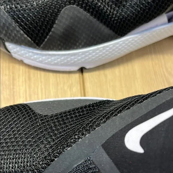 Nike Flyers Black and White Slip-On Sneakers with Cushioned Sole