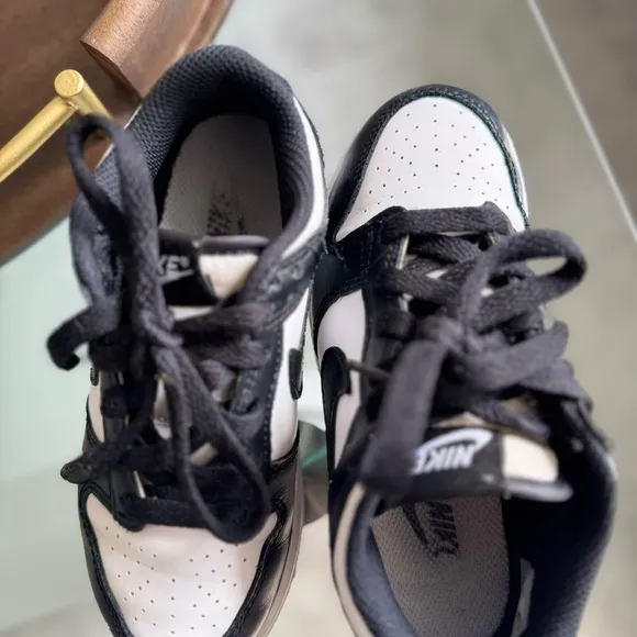 Nike Kids Black and White Sneakers, used but in good condition no box.