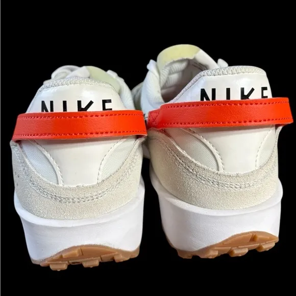Nike-NWOB women’s sz.11.5 waffle debut sneakers animal print swoosh/orange. New!