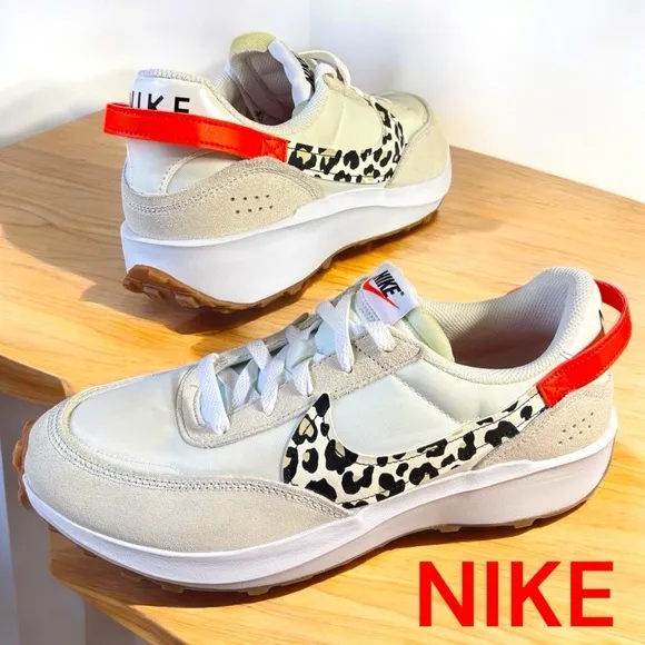 Nike-NWOB women’s sz.11.5 waffle debut sneakers animal print swoosh/orange. New!