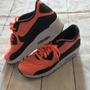 Nike Orange and Black Sneakers with Athletic Design