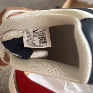 Nike' White and Blue Sneakers