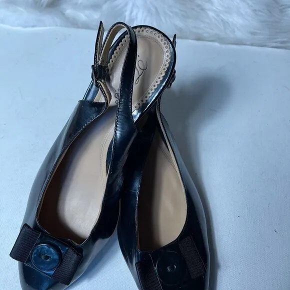 Trotters leather black sling back shoes Round toe embellished with a bow SZ11W