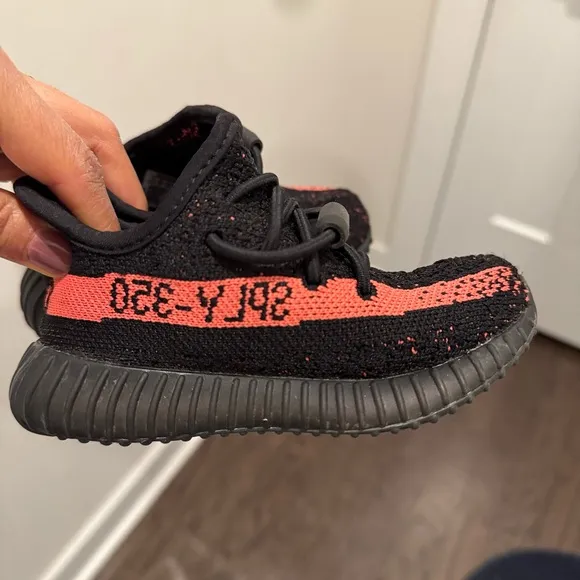 Yeezy Black and Pink Sneakers with Knit Upper and Ribbed Sole