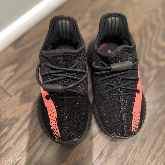 Yeezy Black and Pink Sneakers with Knit Upper and Ribbed Sole