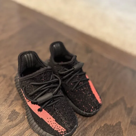 Yeezy Black and Pink Sneakers with Knit Upper and Ribbed Sole